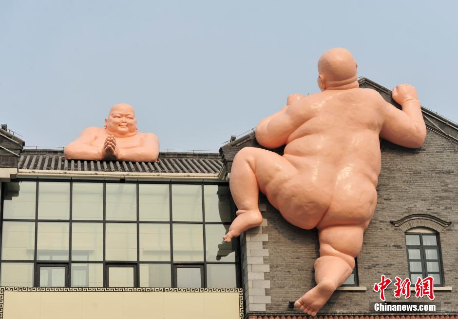 攀房“裸佛”亮相濟南 似現(xiàn)實版“佛跳墻”